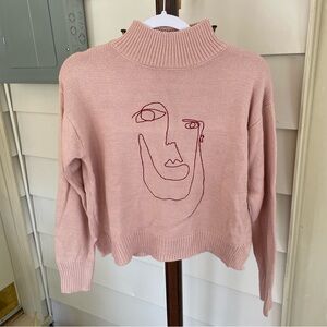 Sanye- Pink Sweater with Abstract Face